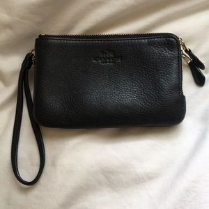 Solid black coach leather wristlet